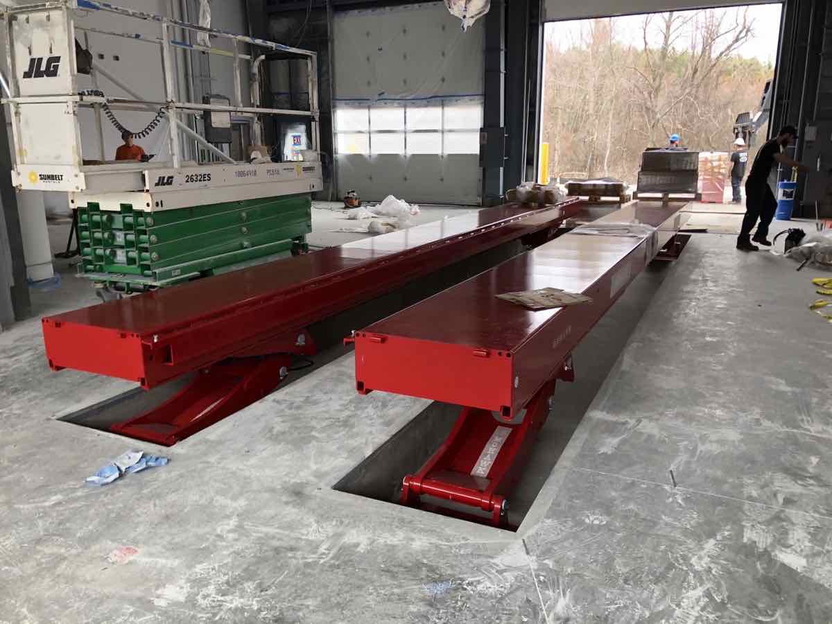 Mohawk vertical-rise lift being installed at the Town of Burlington, MA DPW
